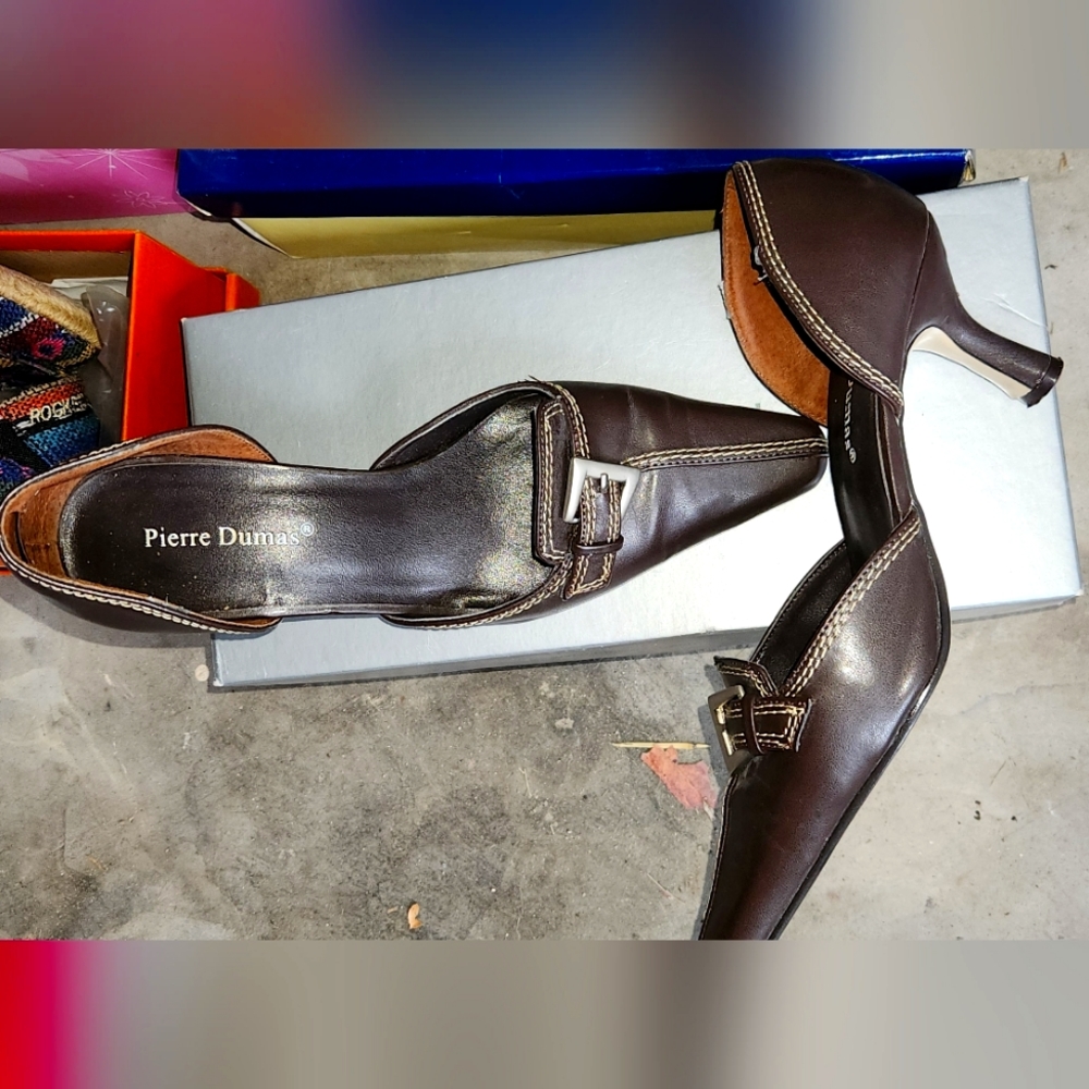 Genuine leather brown kitten heeled shoes.